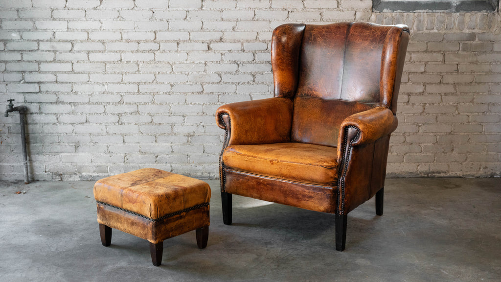 1970s Vintage Art Deco Distressed Cognac Leather Wingback Chair & Ottoman