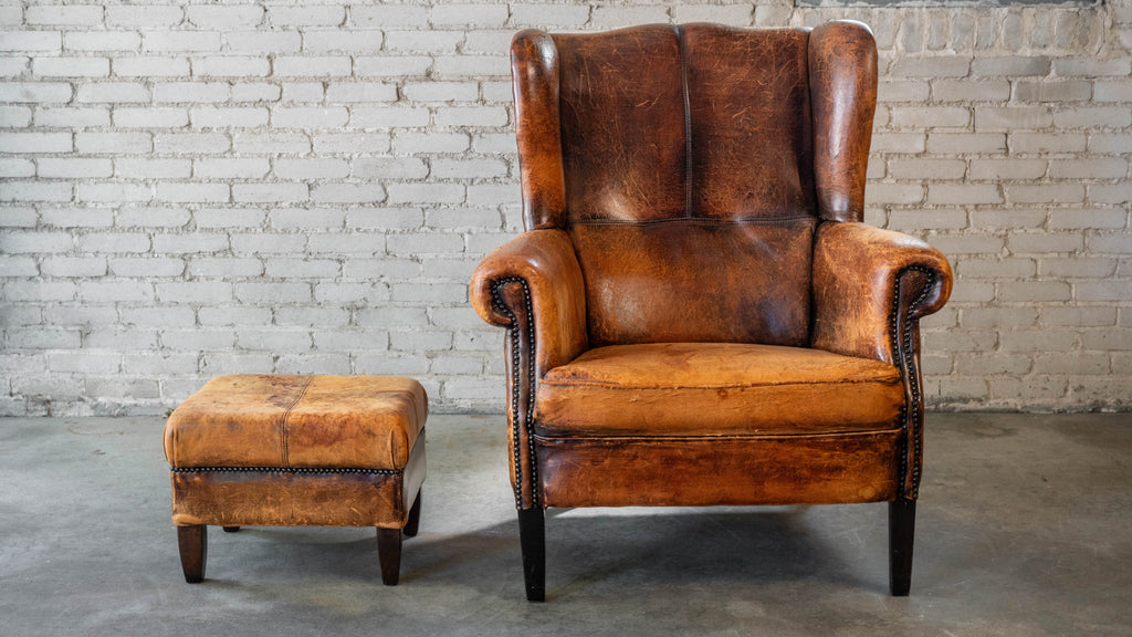 1970s Vintage Art Deco Distressed Cognac Leather Wingback Chair & Ottoman
