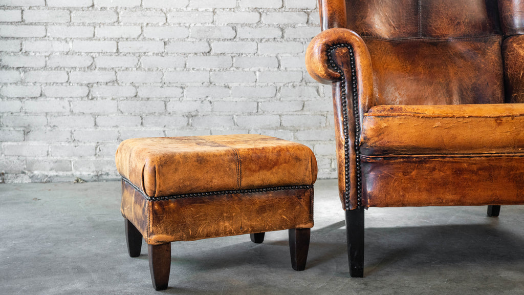 1970s Vintage Art Deco Distressed Cognac Leather Wingback Chair & Ottoman