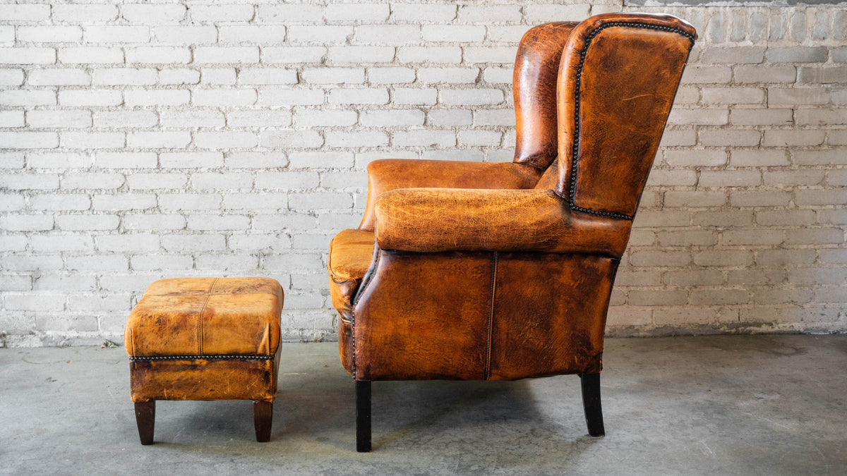 1970s Vintage Art Deco Distressed Cognac Leather Wingback Chair & Ottoman