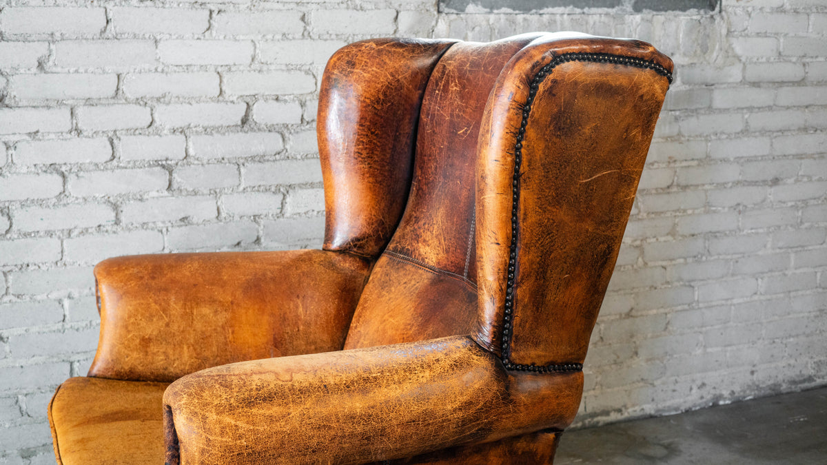 1970s Vintage Art Deco Distressed Cognac Leather Wingback Chair & Ottoman