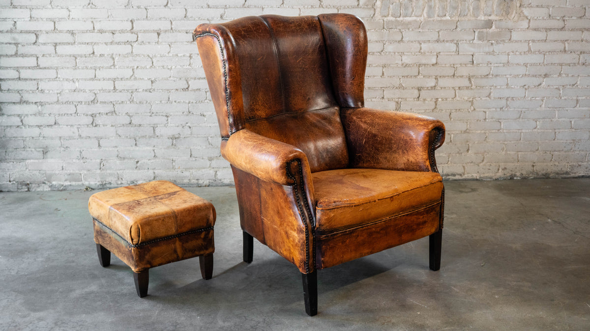 1970s Vintage Art Deco Distressed Cognac Leather Wingback Chair & Ottoman