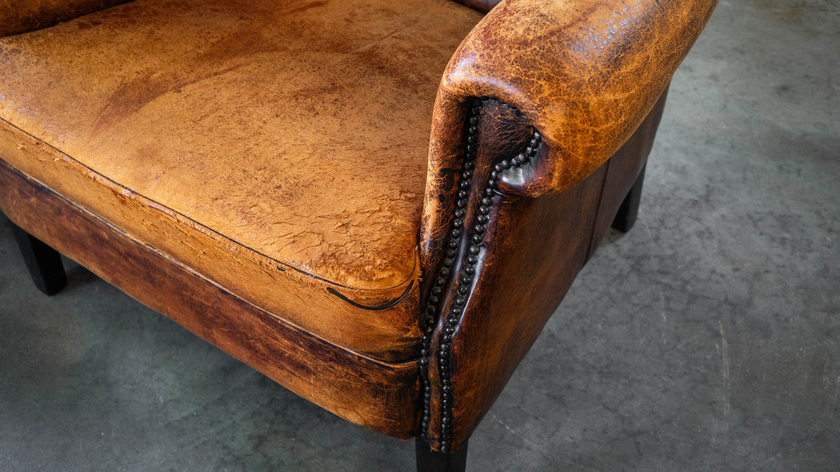 1970s Vintage Art Deco Distressed Cognac Leather Wingback Chair & Ottoman